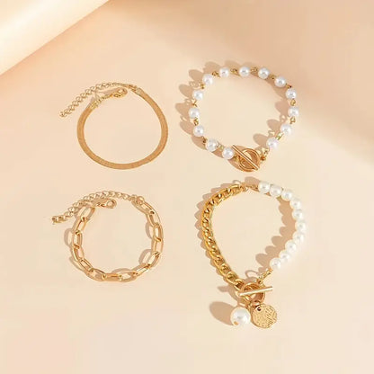 Chique gouden 4-delige armbandenset – slangenketting, parels en schakels | Goud