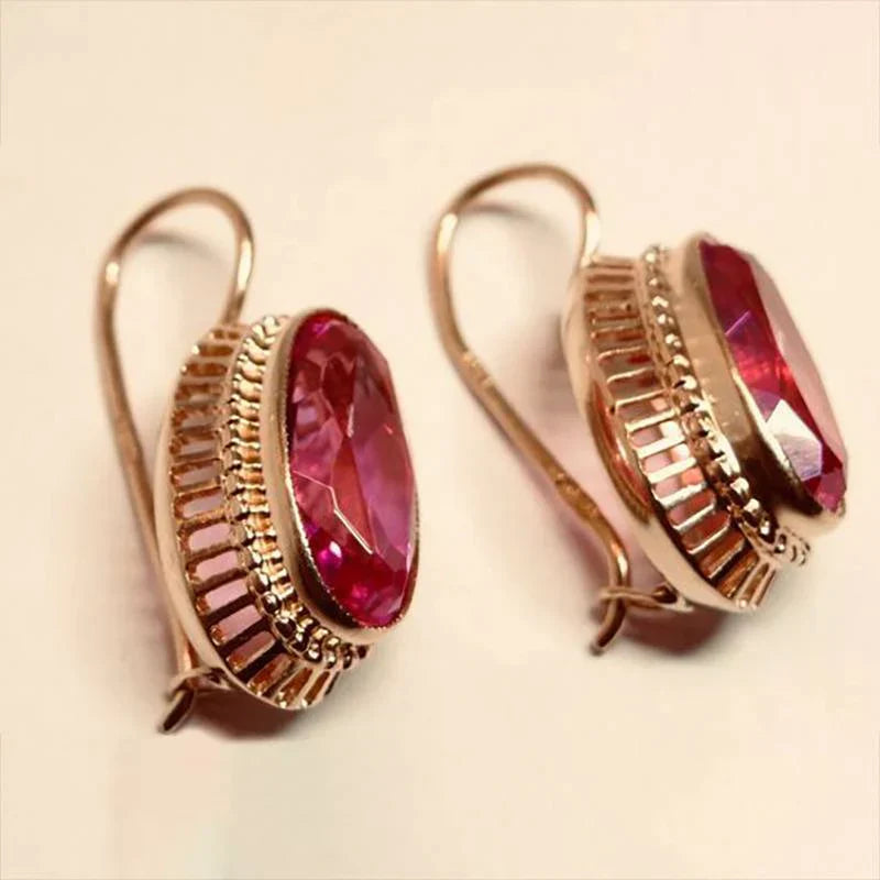 Vintage oorbellen met zwarte steen | Goud