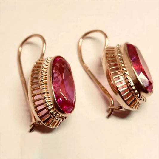 Vintage oorbellen met zwarte steen | Goud
