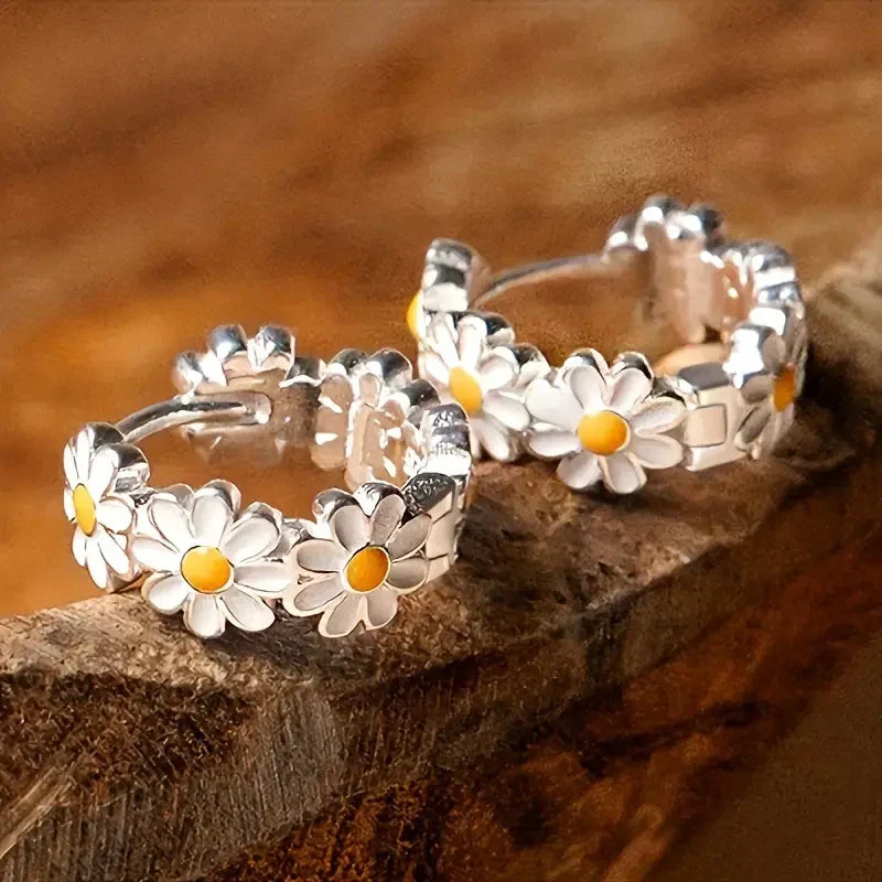Elegante margriet-oorringen | Witgoud