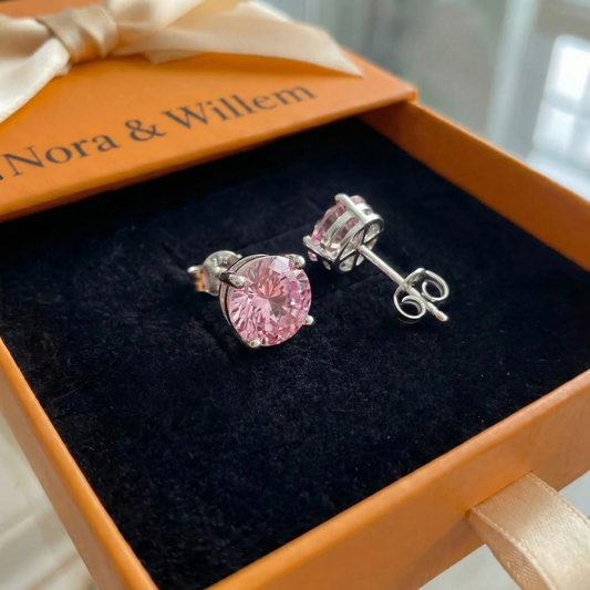 Ronde oorstekers met roze saffier | Witgoud